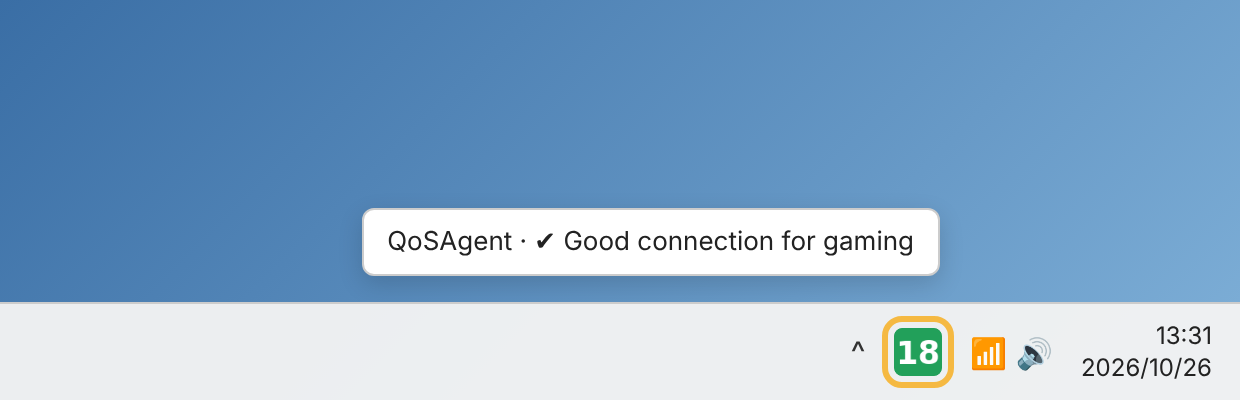 The QoSAgent icon next to the clock